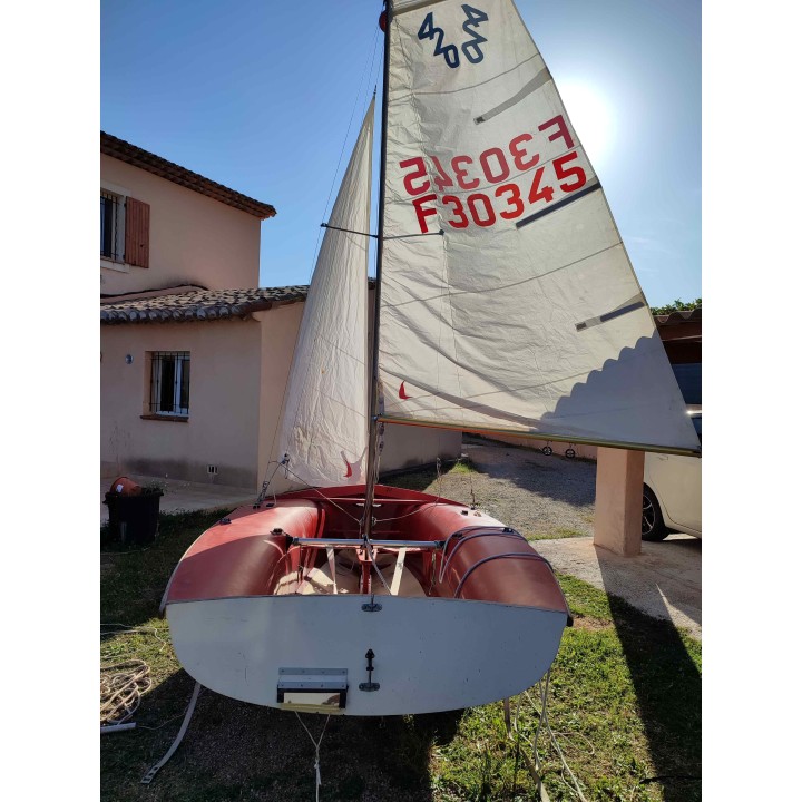 Red 420 sailing dinghy, well maintained and in good condition